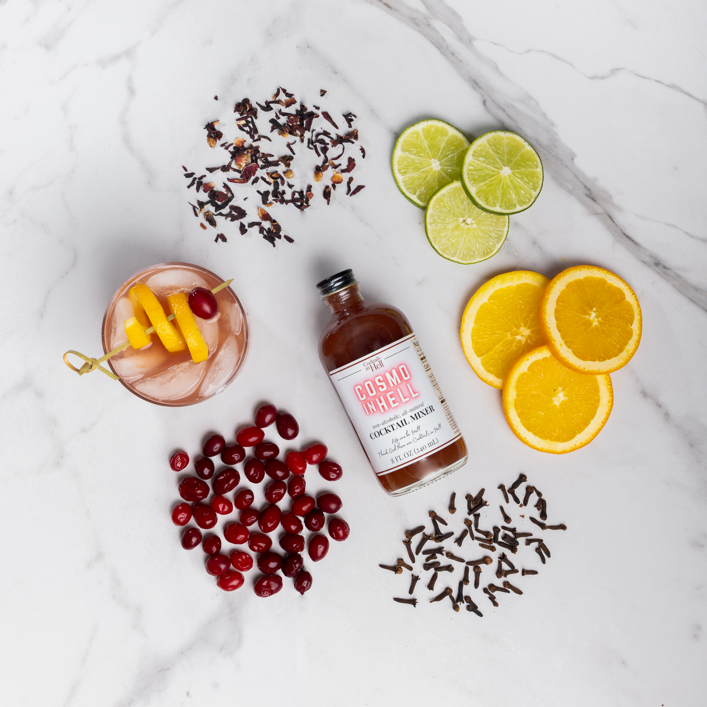 Cocktails In Hell Cosmo in Hell Cocktail Mixer Bottle with orange, cranberry, lime and spices