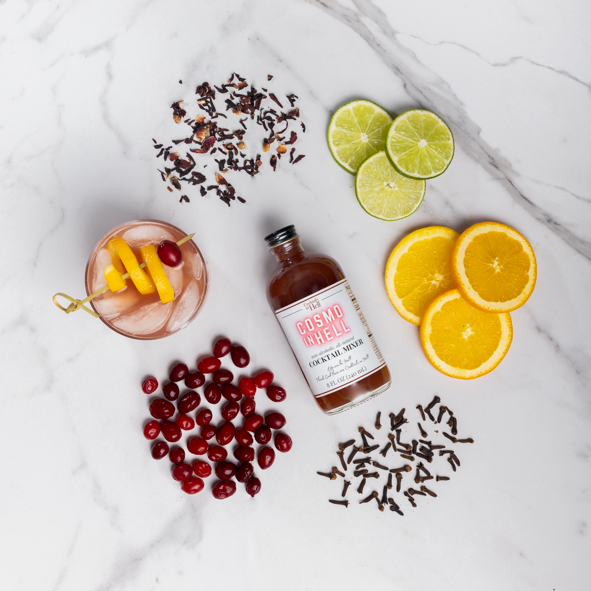 Cocktails In Hell Cosmo in Hell Cocktail Mixer Bottle with orange, cranberry, lime and spices