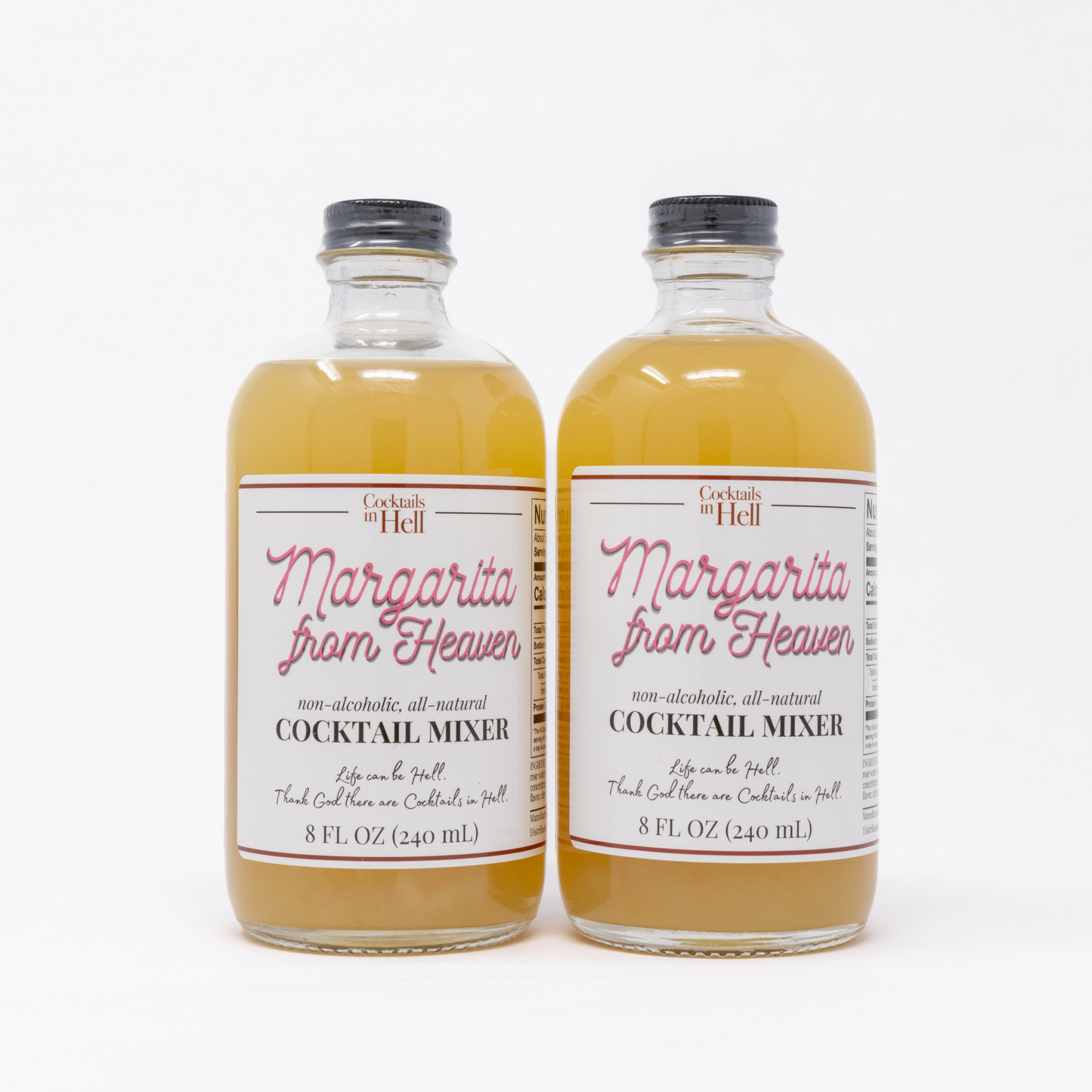 Glass bottle of Cocktails in Hell Margarita from heaven cocktail mixer